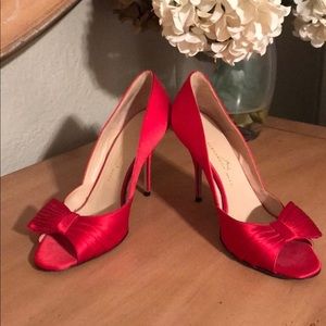 Alexandra Neel satin bow peep toe pumps.